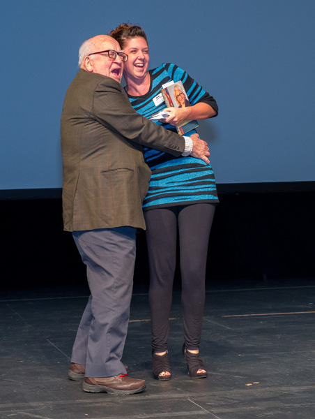 marin with ed asner getting on stage image
