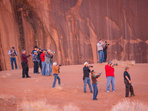 photographers catching the running horses in the box canyon