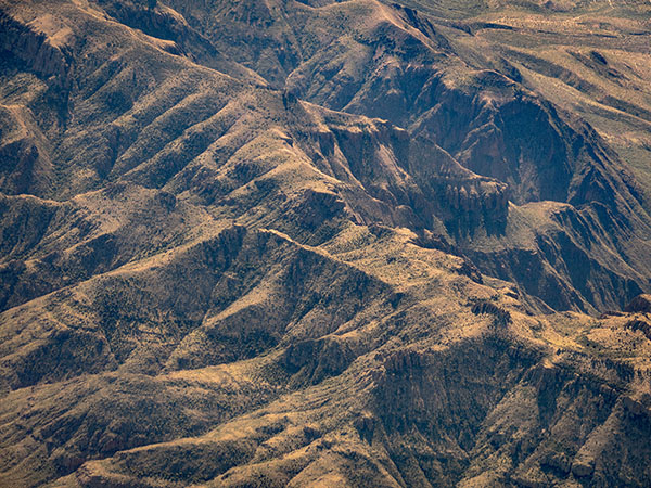 airline window view of desert photo